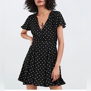 Zara black mini dress with yellow lemon print, size M.